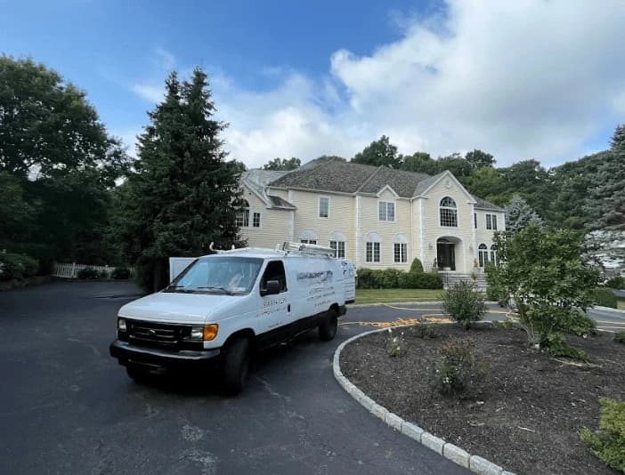Wadsworth Power Washing technician performing thorough gutter cleaning service in Wadsworth